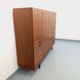 High Scandinavian modernist vintage sideboard in teak and black metal.