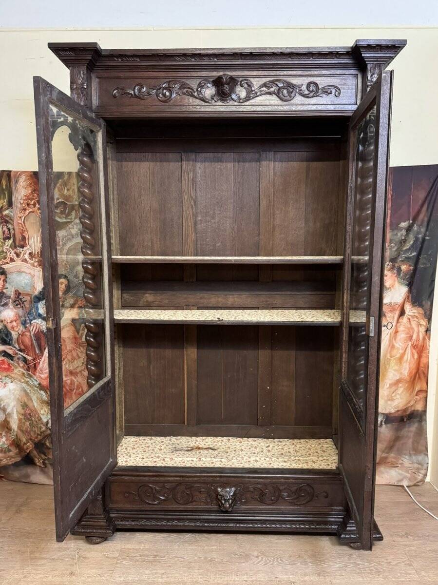 Renaissance style hunting lodge library in carved oak circa