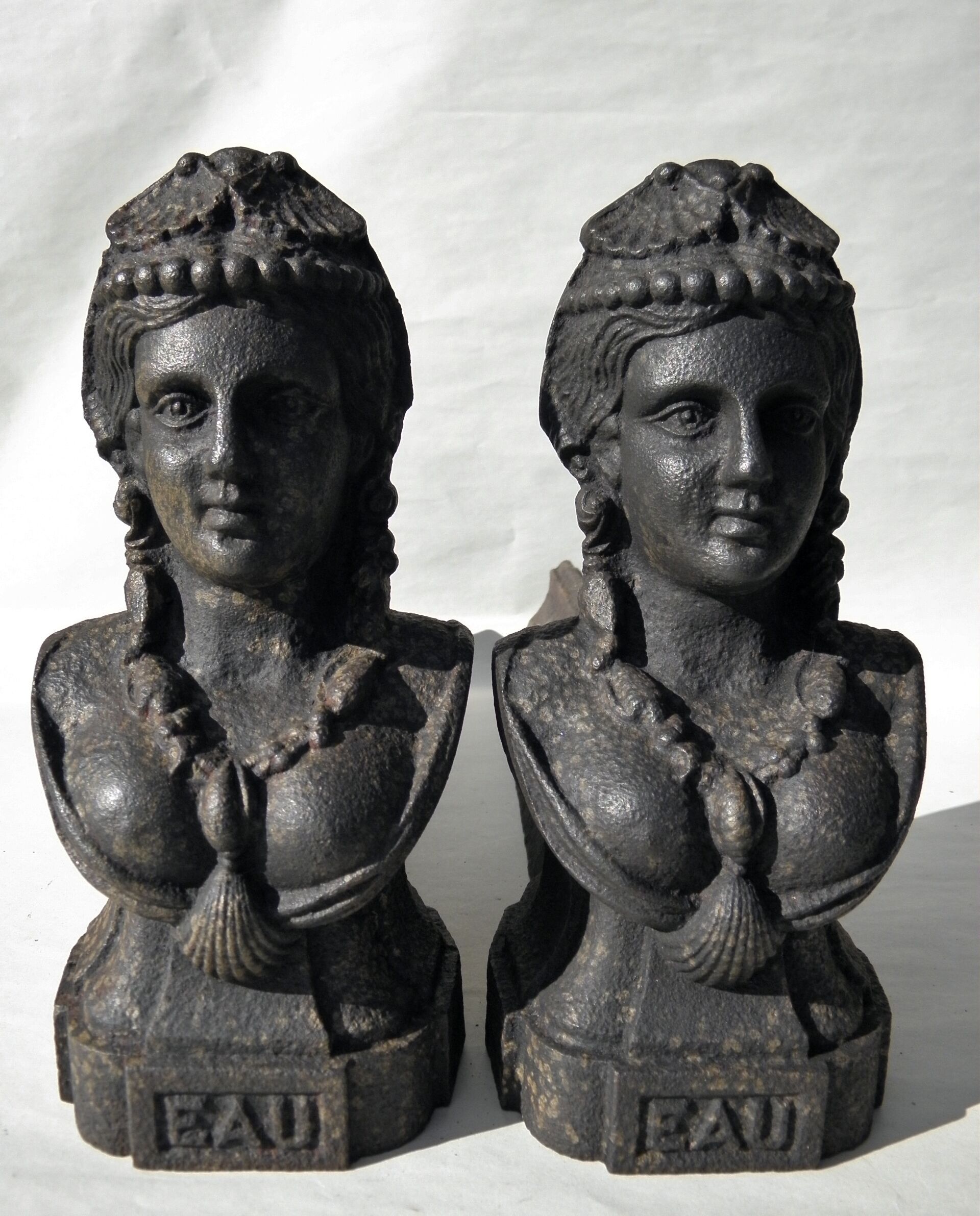 Paire de chenets en fonte