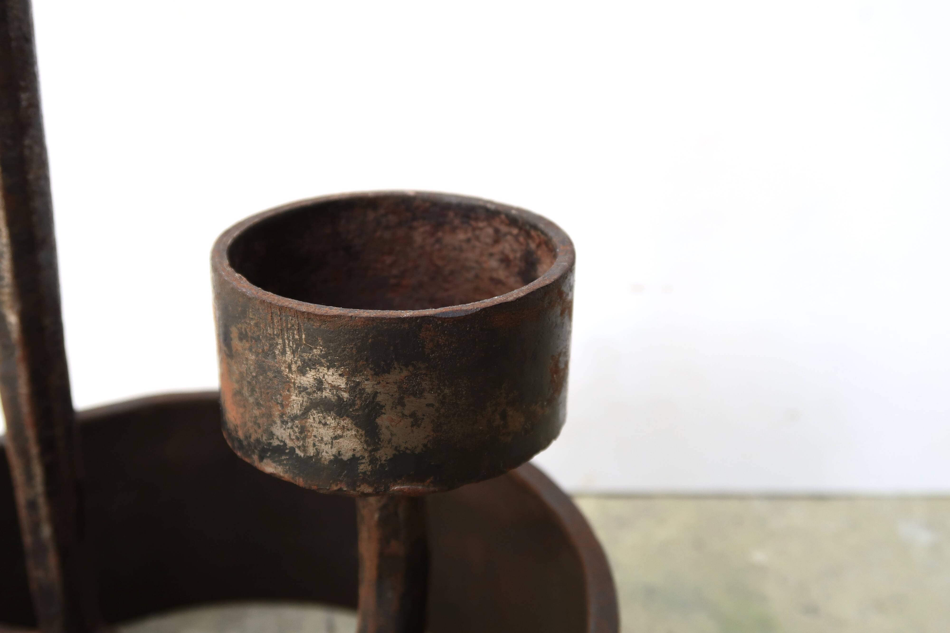 Imposing brutalist wrought iron candlestick "spear", signed, 1950s.