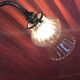 Brass and glass tulip sconce