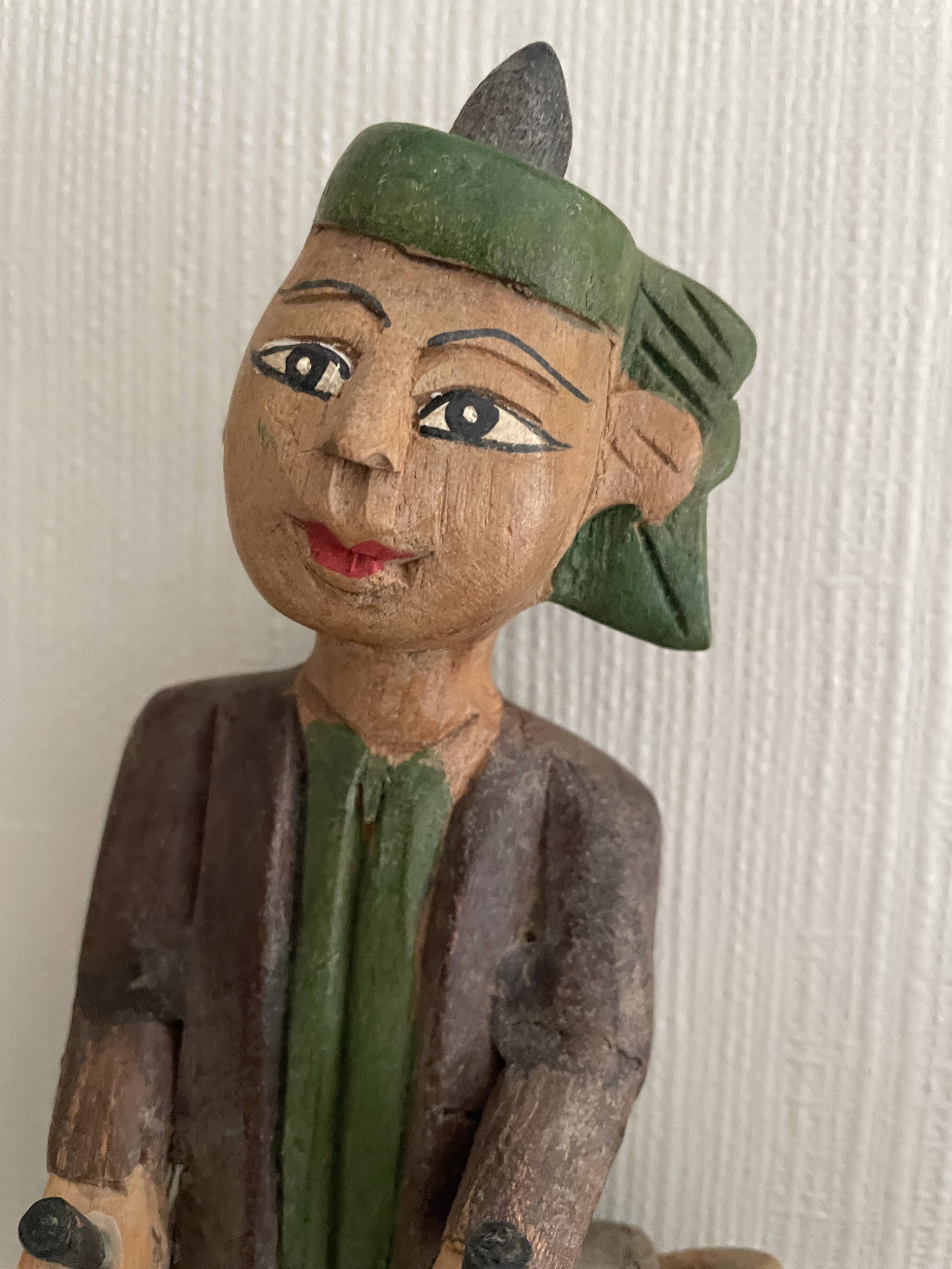 Polychrome wooden statuettes musicians from Asia