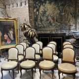 Suite of 12 Louis XVI style chairs model of Georges Jacob with Console Late nineteenth