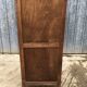 Art deco oak display cabinet with 1 glass door.