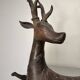 Solid bronze deer 20kg (1979), with period sales certificate.