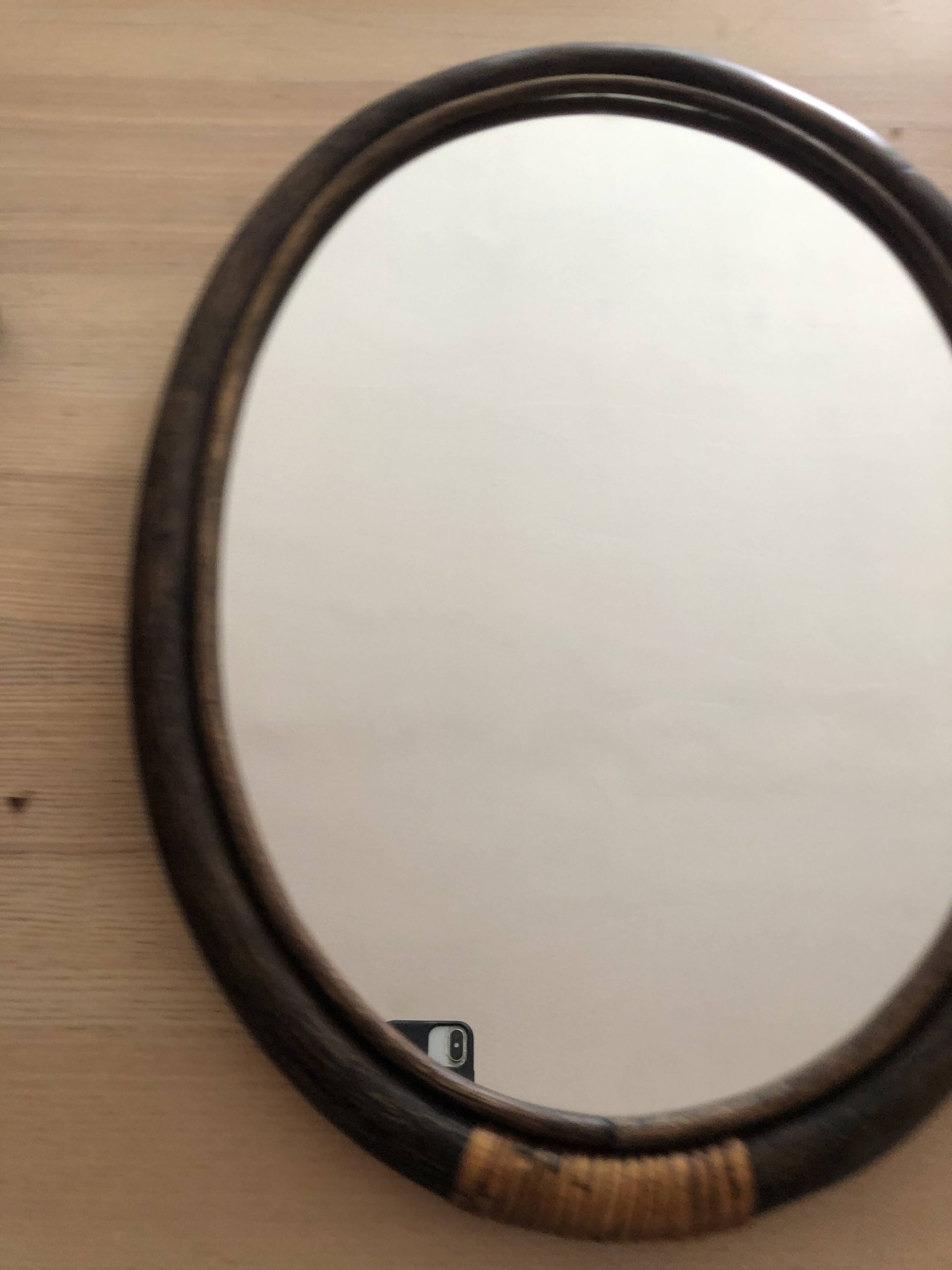 Oval rattan mirror