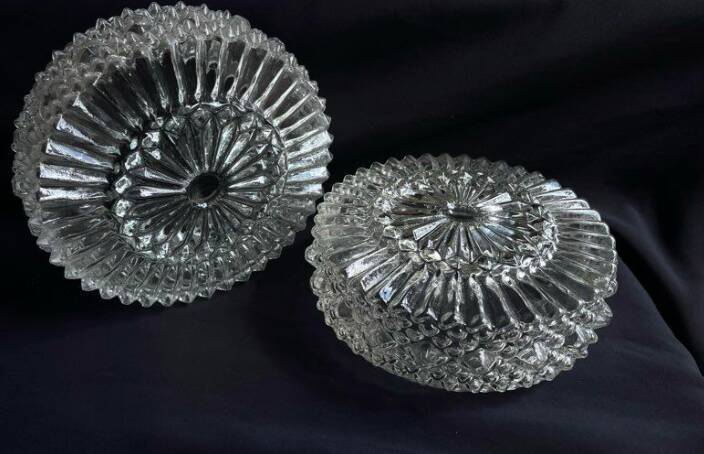 Pair of round vintage moulded glass ceiling lights.