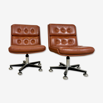 Pair of vintage leather armchairs