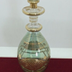 Vial / perfume bottle in tinted and cut glass golden border