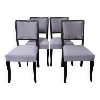 Set of 4 black and grey Art Deco chairs made of painted wood and upholstery fabric.