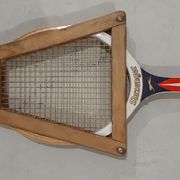 Vintage tennis racket slazenger and its wood frame
