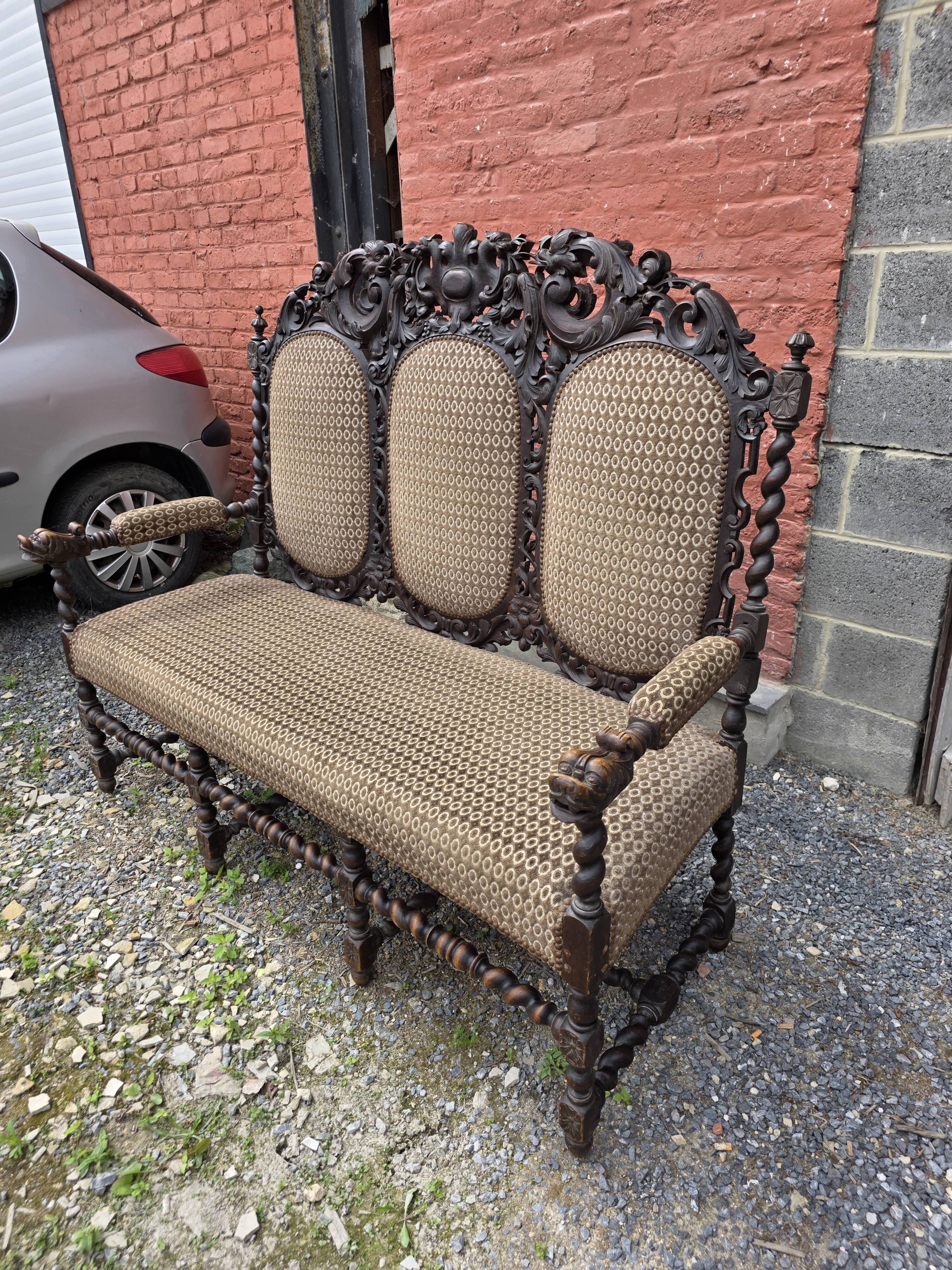 Three-seater armchair in Louis XIII style made of oak from the 19th century.