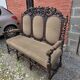 Three-seater armchair in Louis XIII style made of oak from the 19th century.