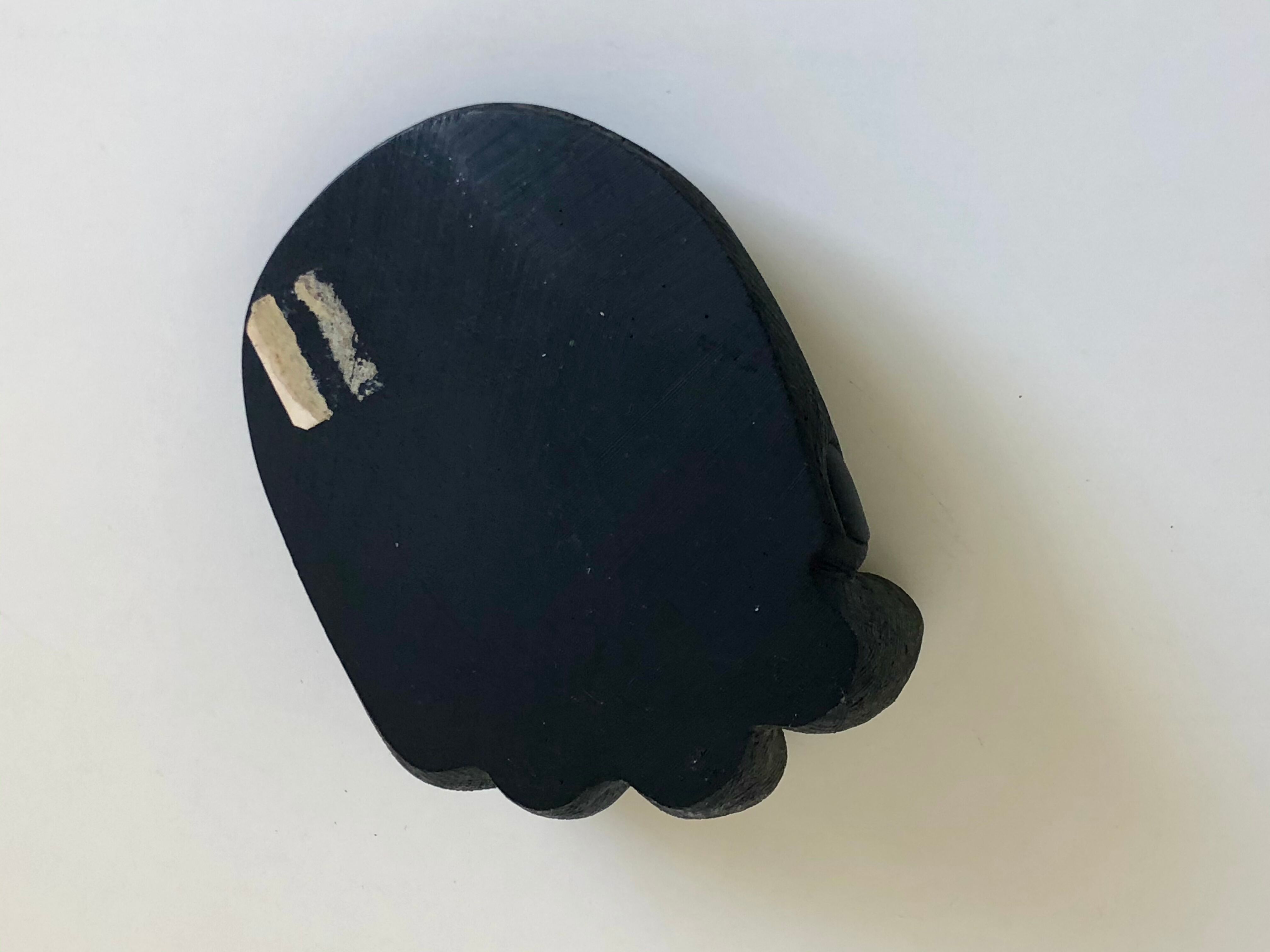 Empty pocket in Hawaiian lava in the shape of a hand signed Coco Joe, 1960