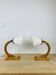 Pair of Art Deco lamps with curved wood and wool.