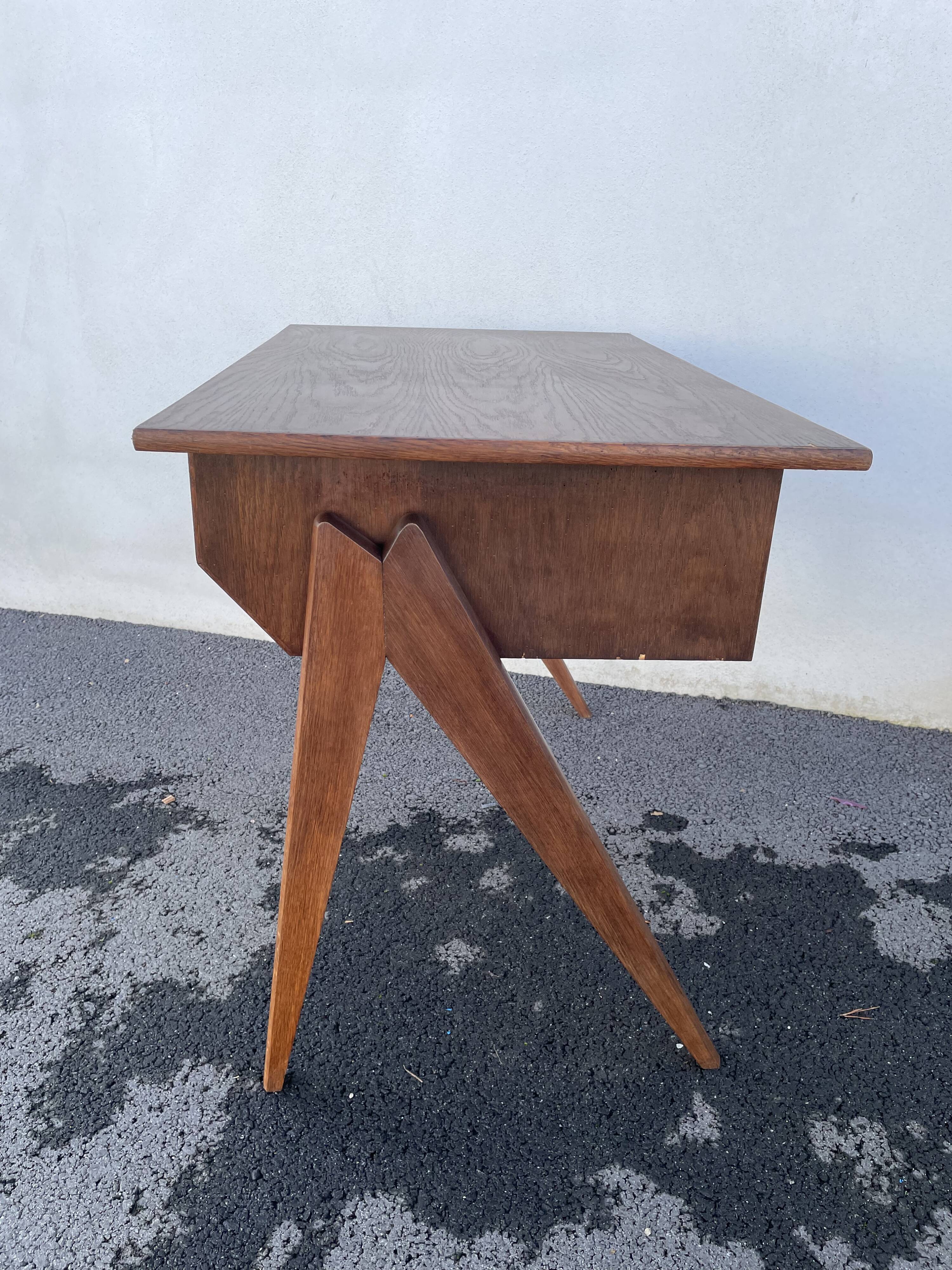 Modernist wooden desk with compass feet 1950