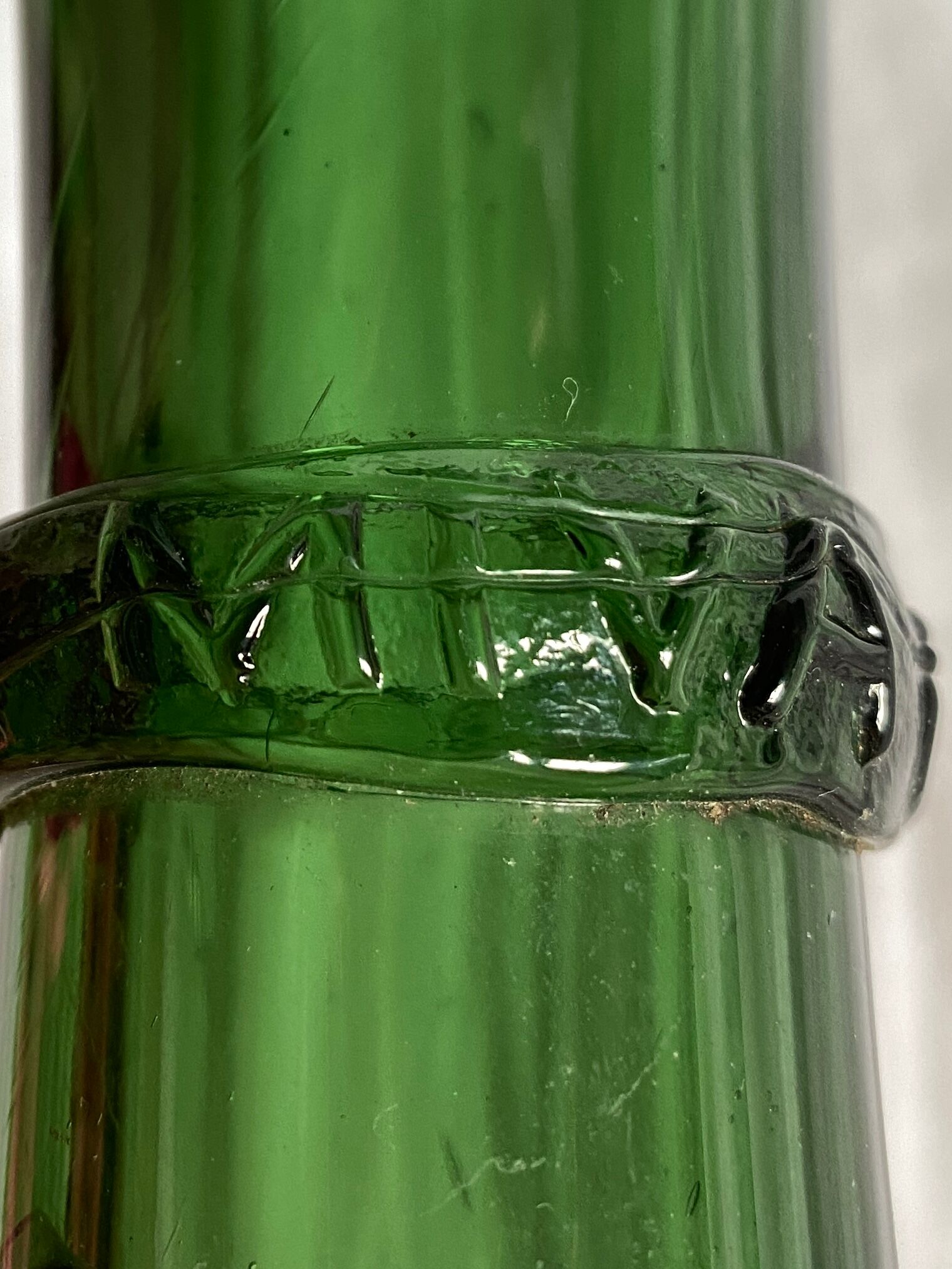 Old Lady Joan in green glass