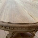 Oval solid walnut dining table on central leg with 4 extensions, 12/15 people