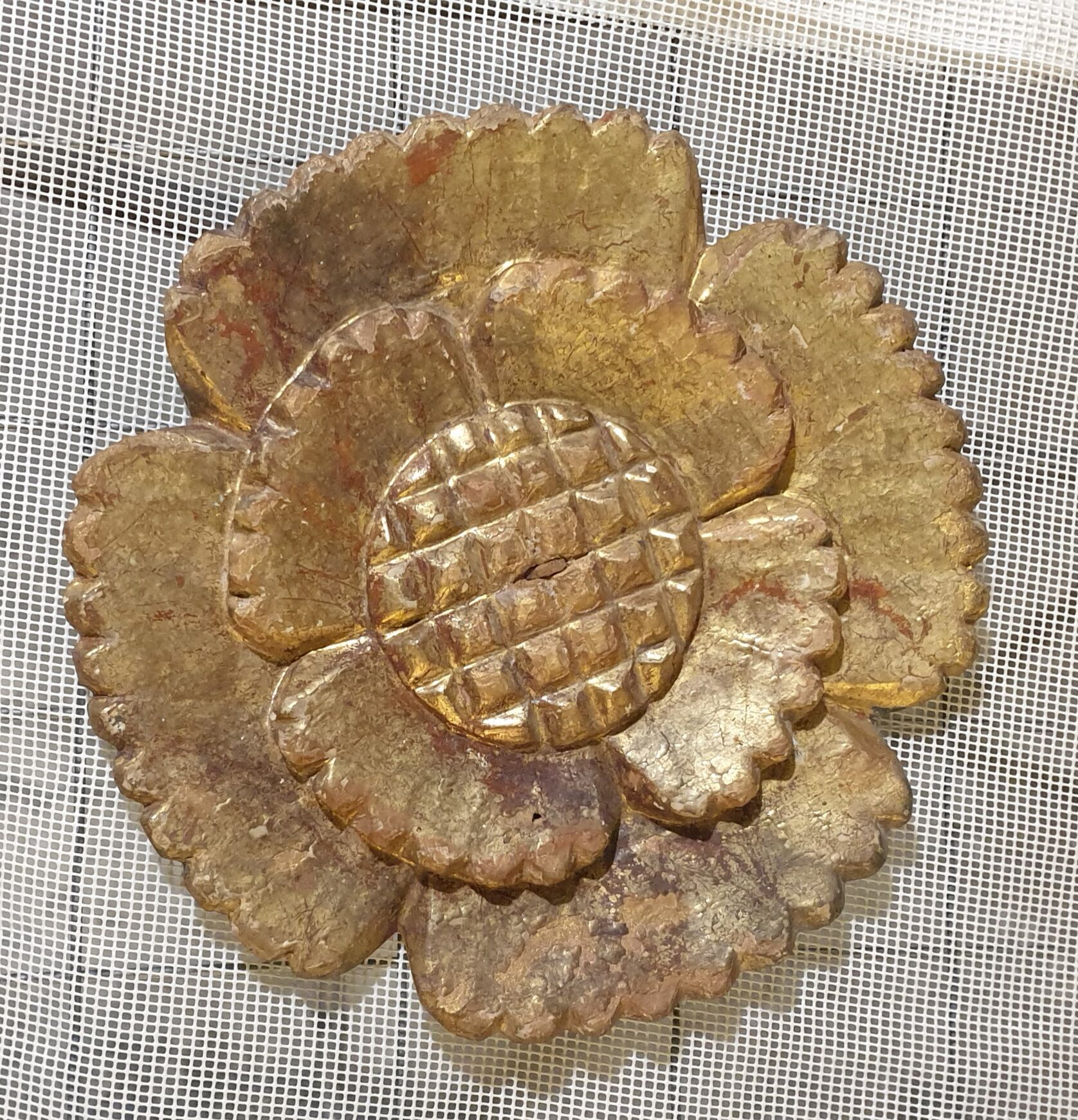 Flower in gilded wood