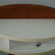 White lasked wood console and 1980s skai background