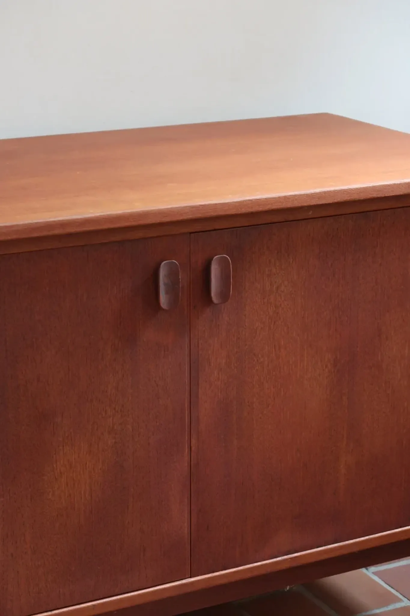 Small Ulferts teak sideboard from the 1960s with integrated handles.