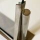 Duo of Art Deco photo frames in silver metal with beveled glass