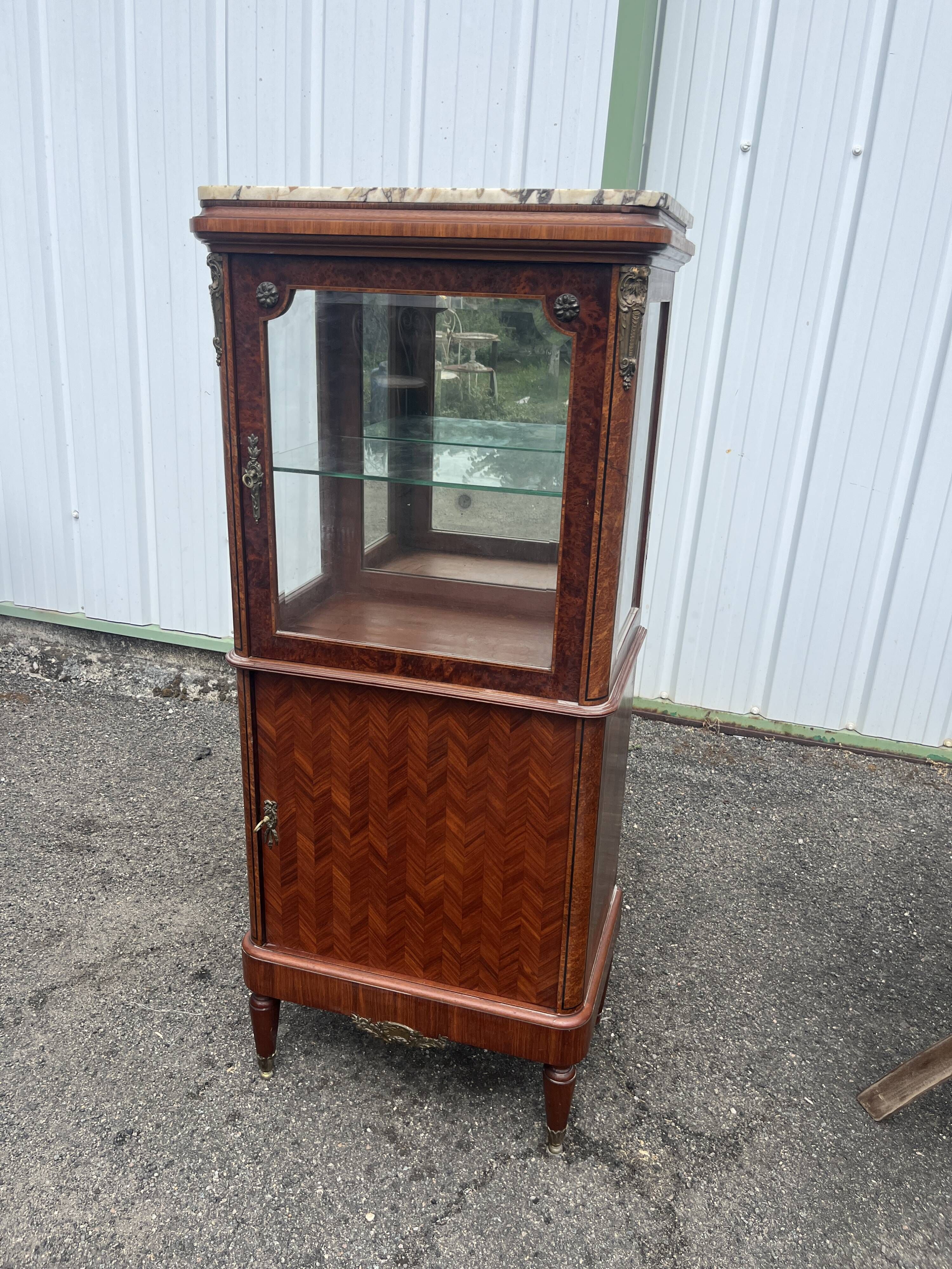 Louis XVI style display cabinet, 19th century, marble and gilded bronzes.