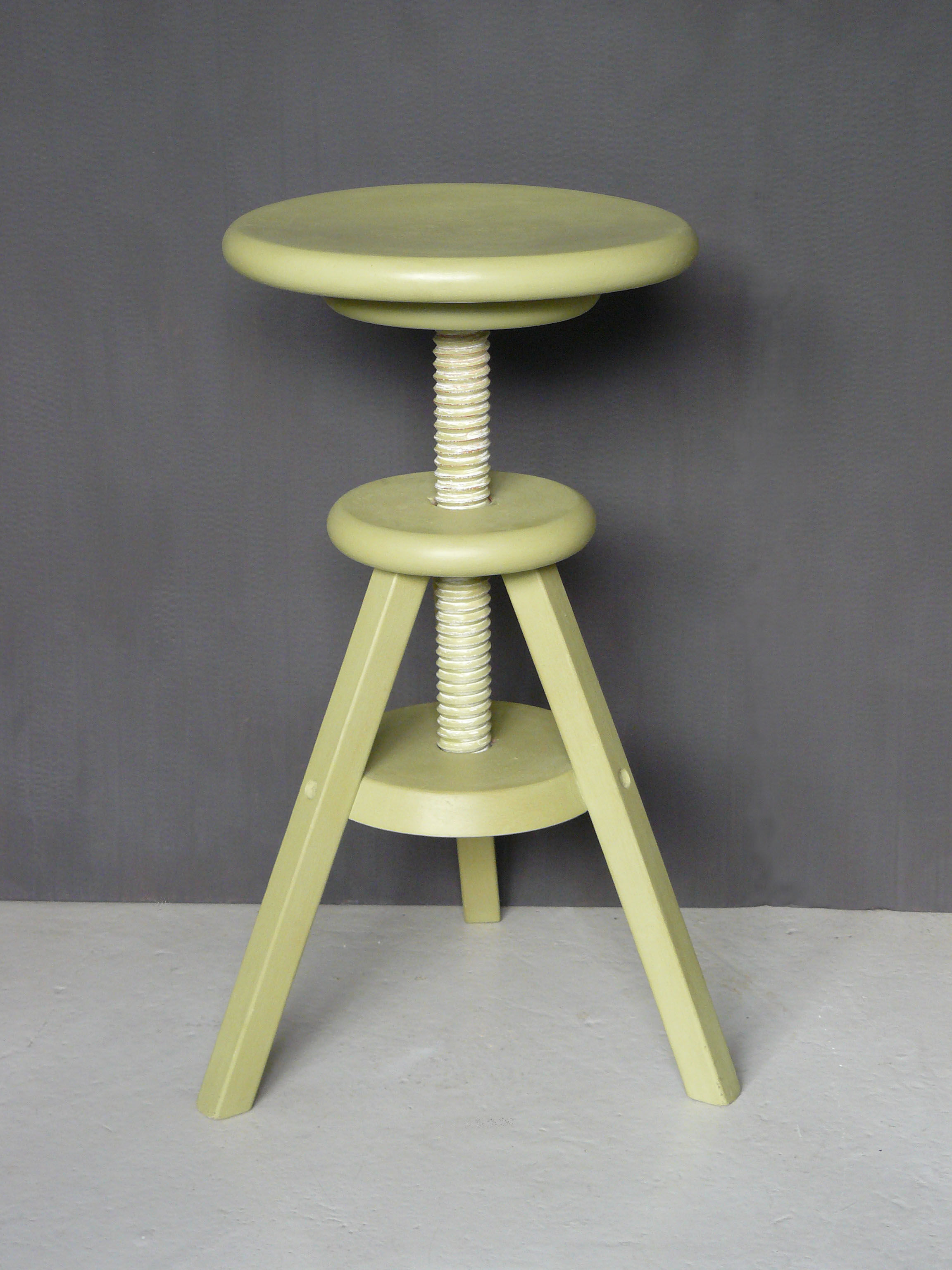 Painted and waxed wooden screw stool