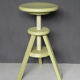 Painted and waxed wooden screw stool