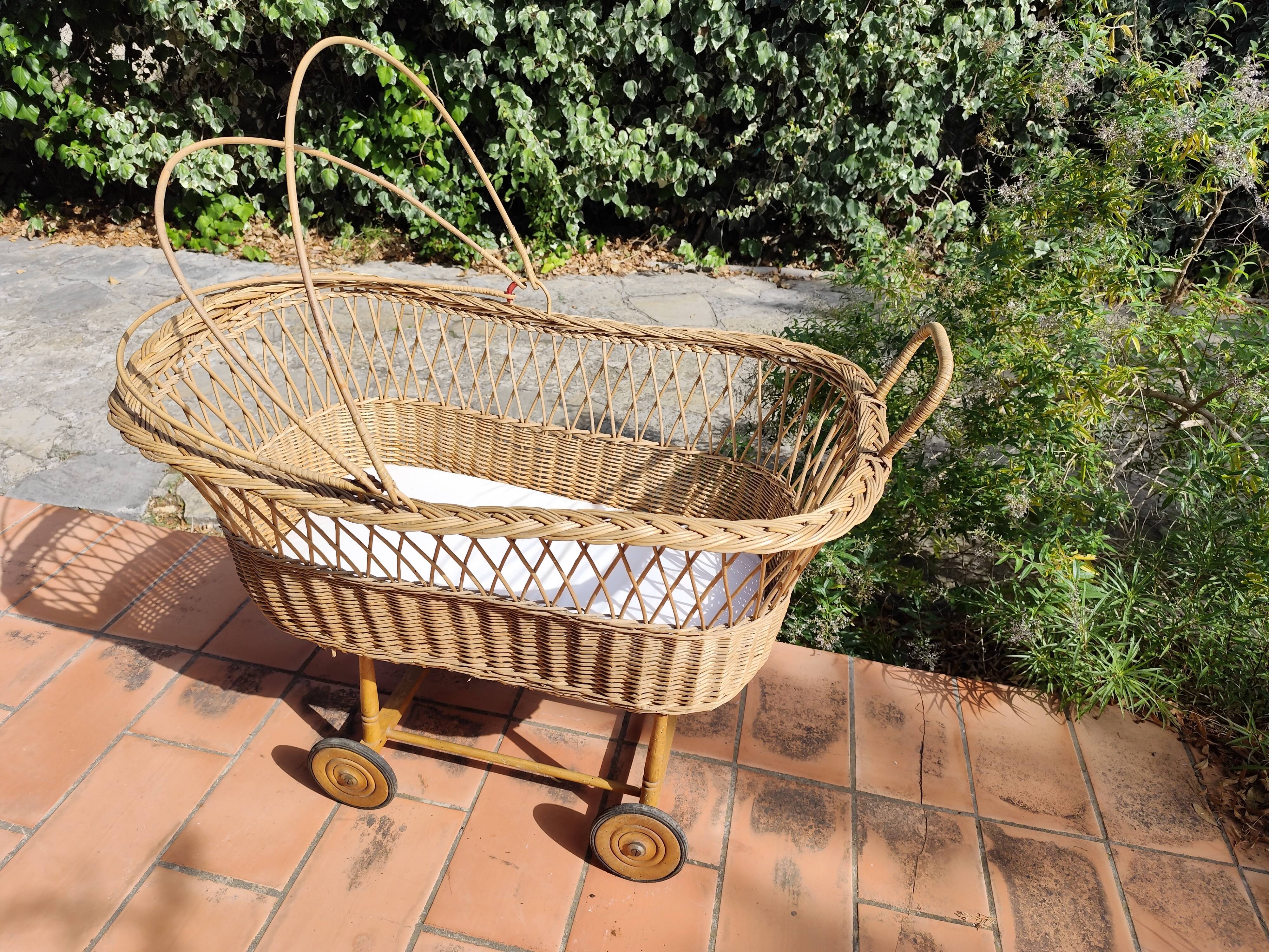 Vintage rattan Alsatian doll cradle bassinet