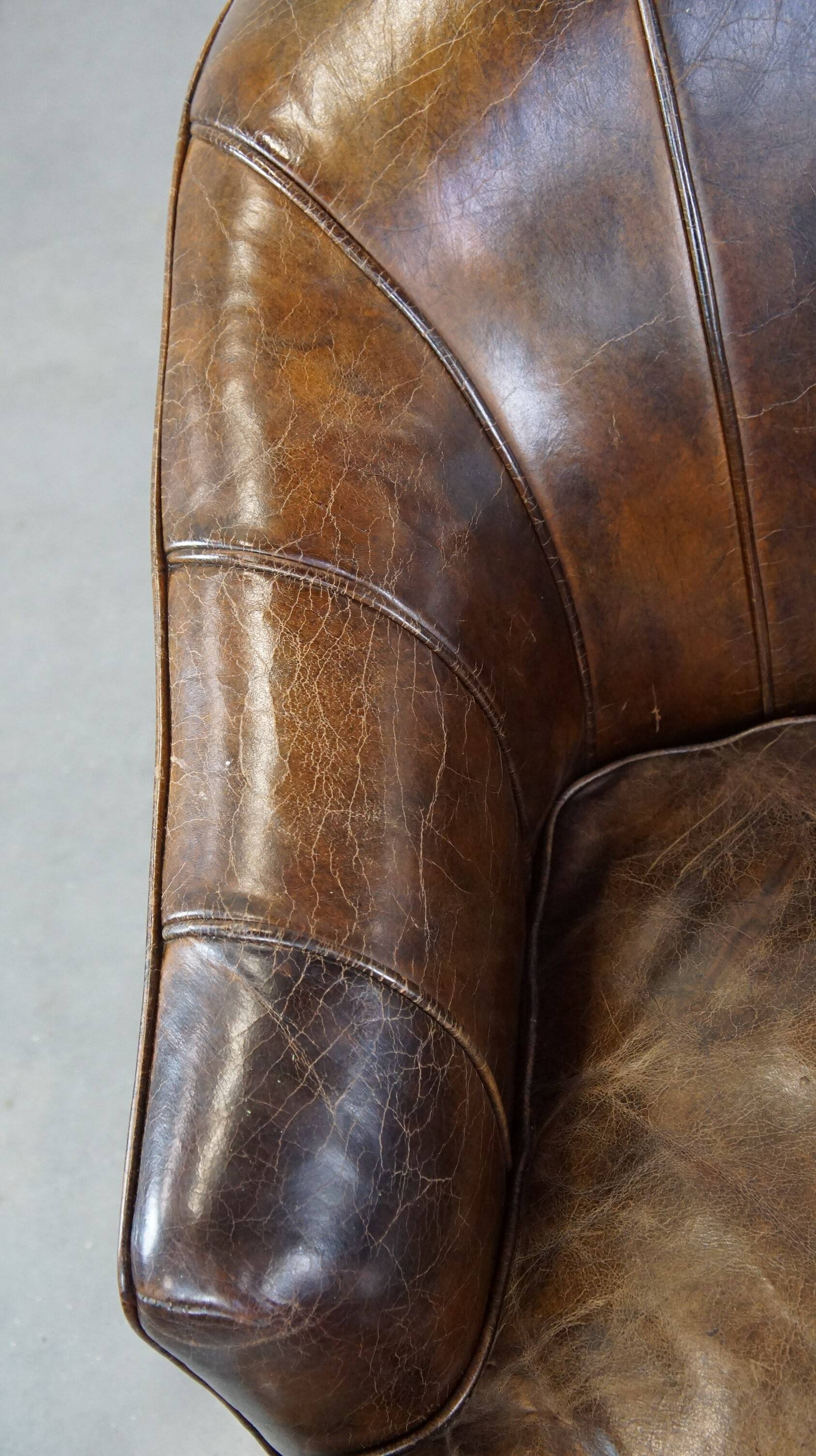 Stylish armchair with a unique design and beautiful finish, made of leather