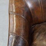Stylish armchair with a unique design and beautiful finish, made of leather