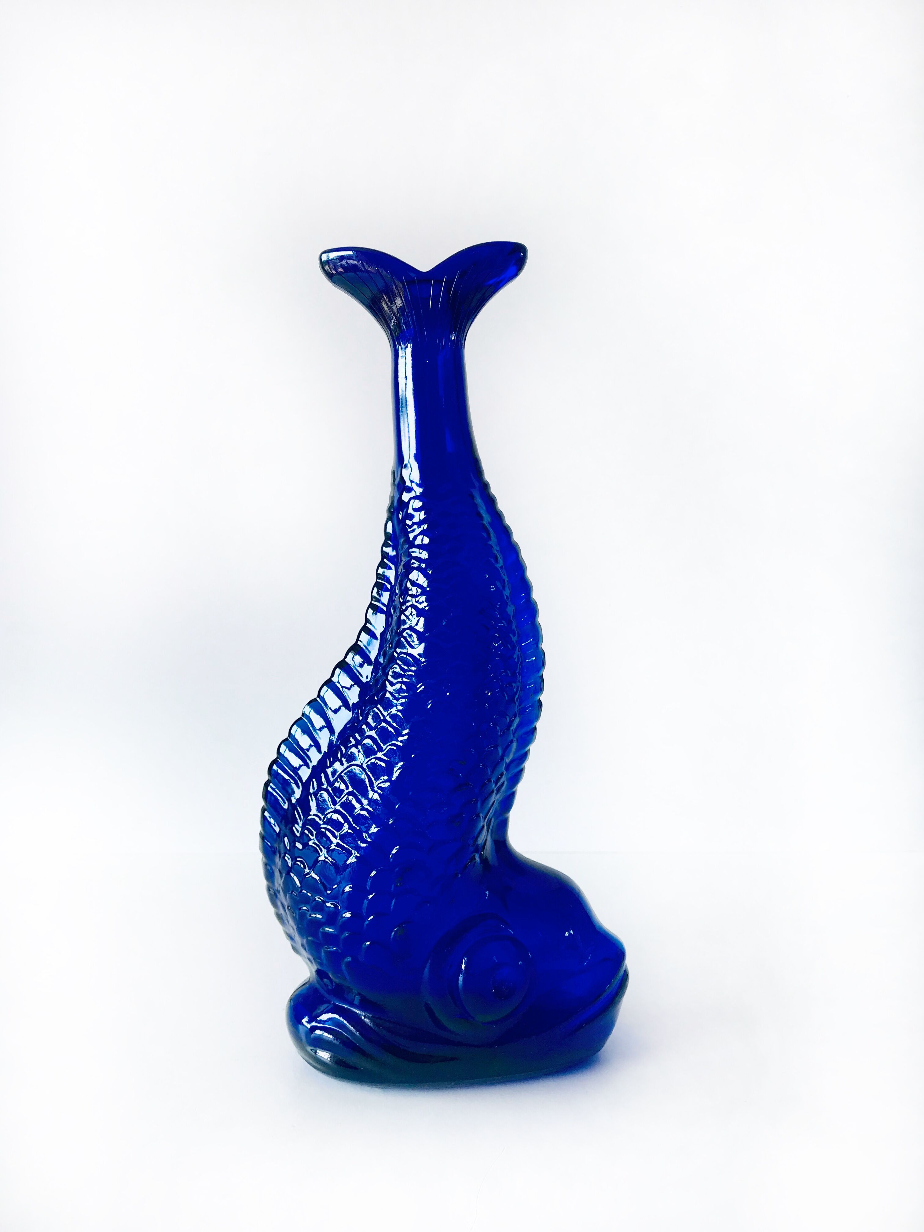 Blue glass fish vase