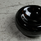Ceramic ashtray of round shape of the 80s.
