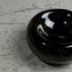 Ceramic ashtray of round shape of the 80s.