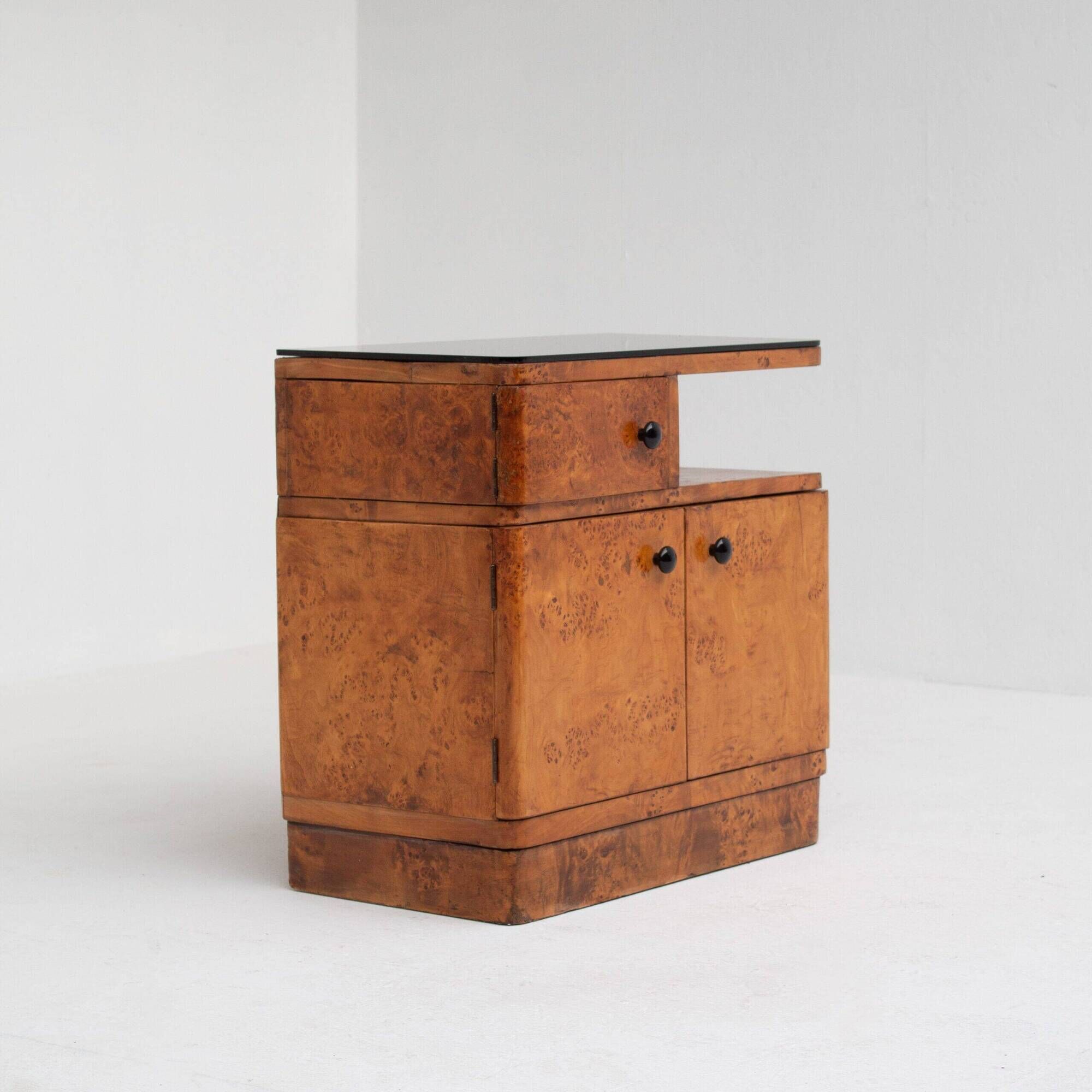 Pair of Art Deco nightstands in burlwood with black lacquered top