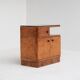 Pair of Art Deco nightstands in burlwood with black lacquered top