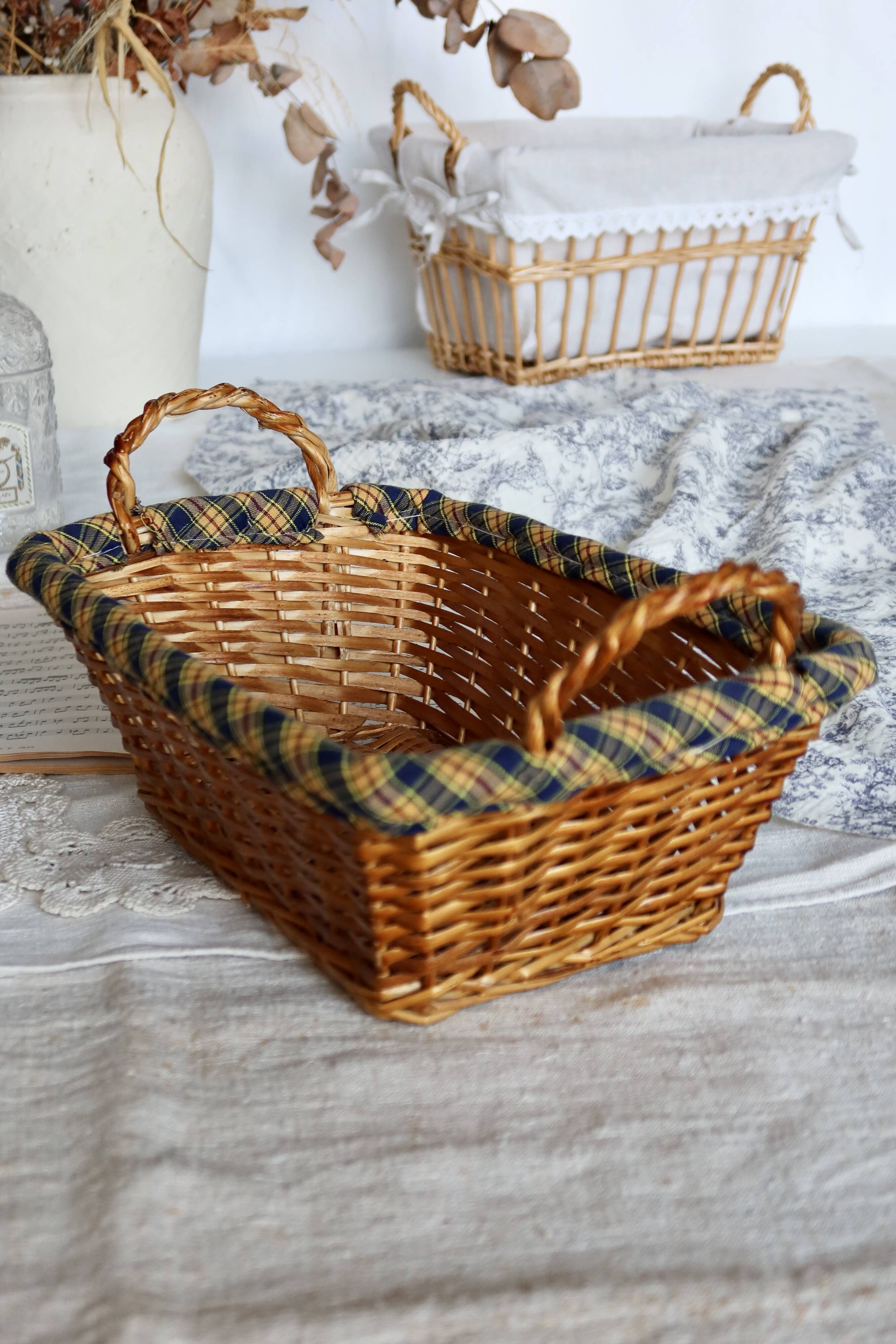 Vintage wicker basket with blue and yellow checkered lining