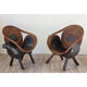 Paire de fauteuils vintage bois sculpté et rotin 1960