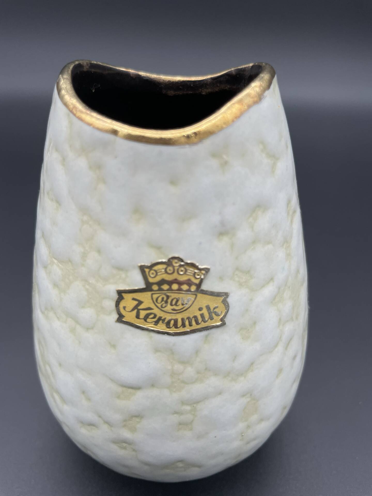 Small Bay Keramik vase with pearlescent glaze and gold trim.