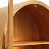 Elegant vintage Danish display cabinet with glass panels and atmospheric lighting