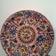 Decorative floral plate signed