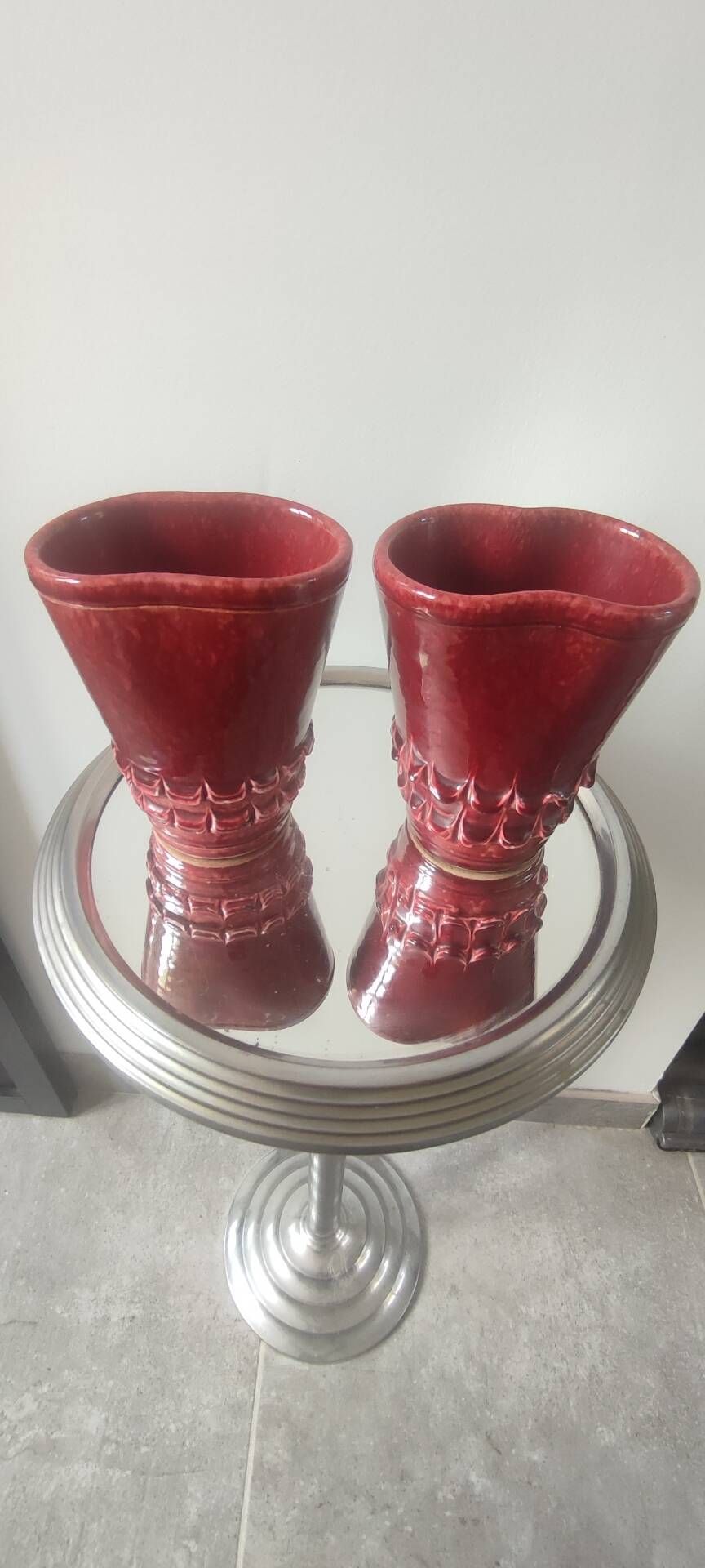 Pair of Art Deco asymmetrical red oxblood ceramic vases