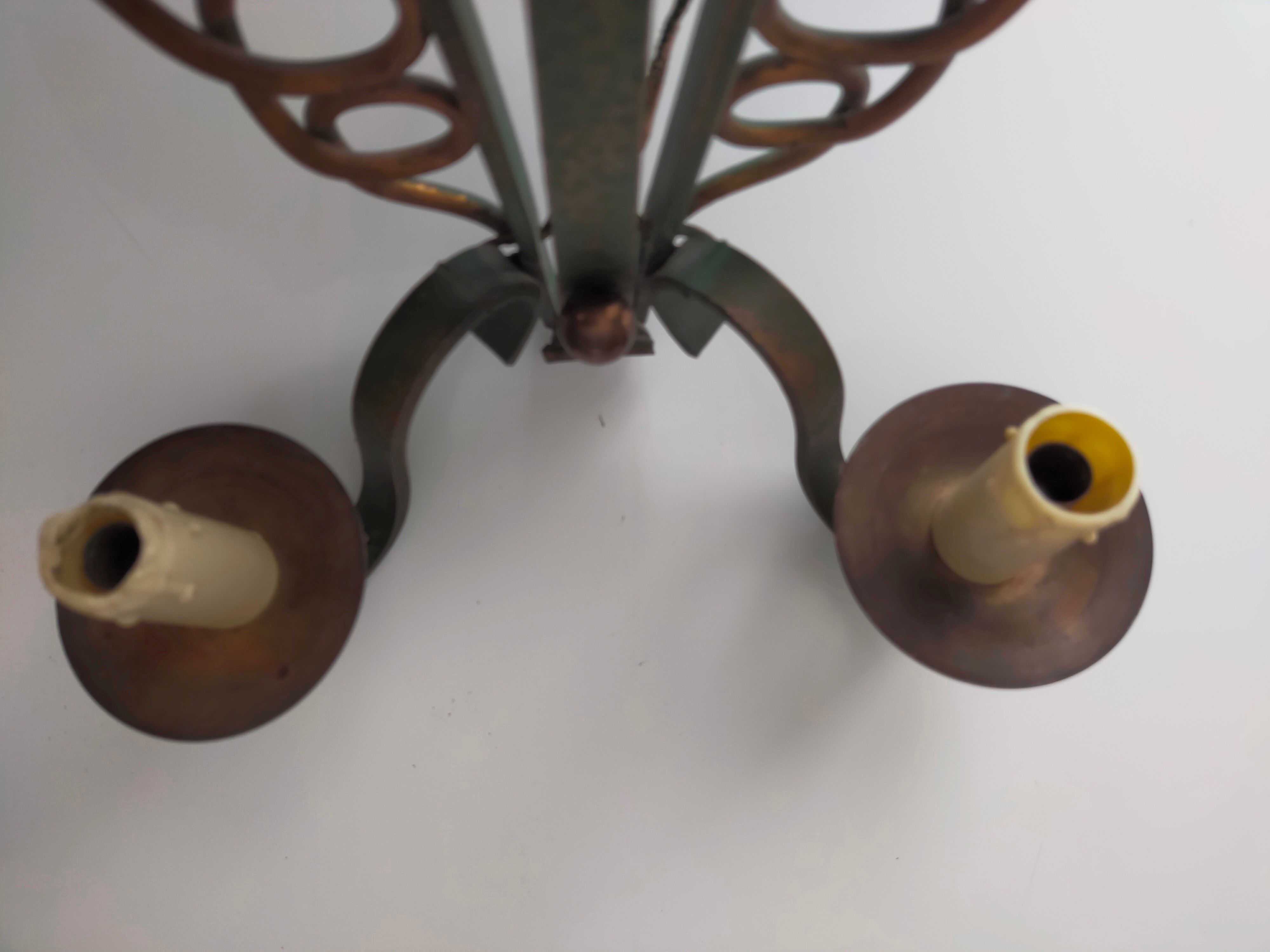 Pairs of vintage wrought iron wall lamps