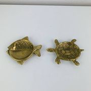 Pair of animal trinket trays in brass, fish and turtle.