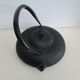 Asian teapot in black cast iron