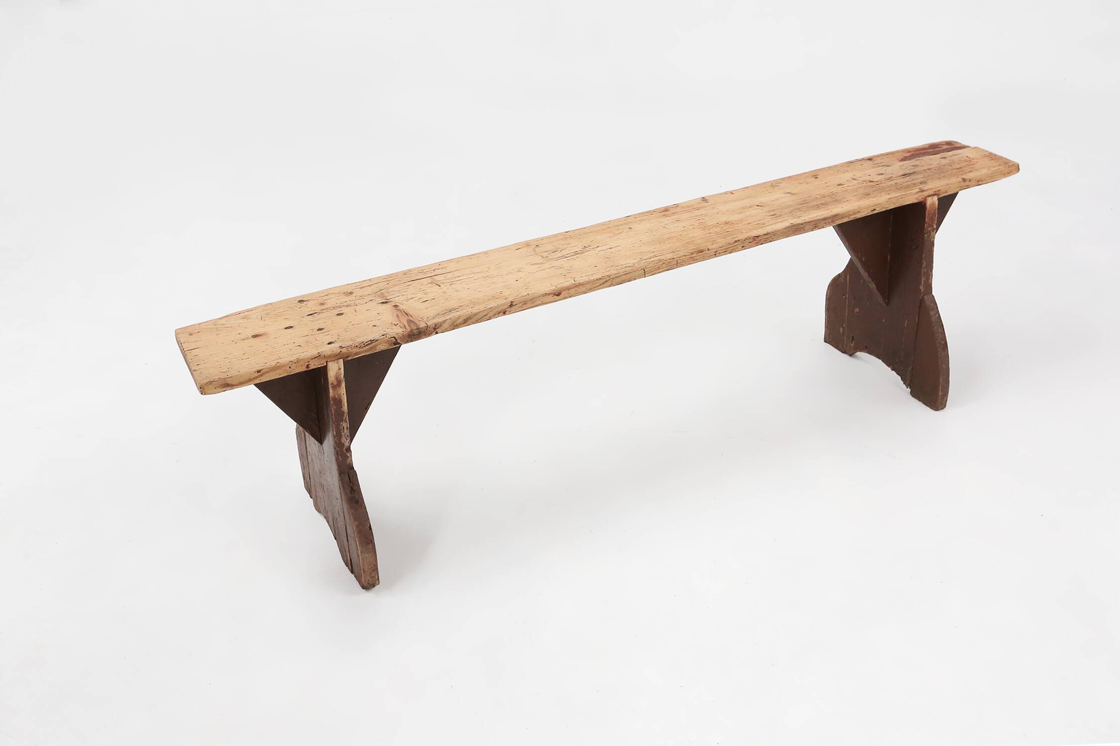 Rustic wooden bench in with brown painted feet, France ca. 1890