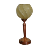 Candlestick lamp with globe