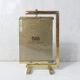 Double-sided carousel photo frame in gold metal