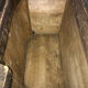 Old wooden chest and yellow velvet